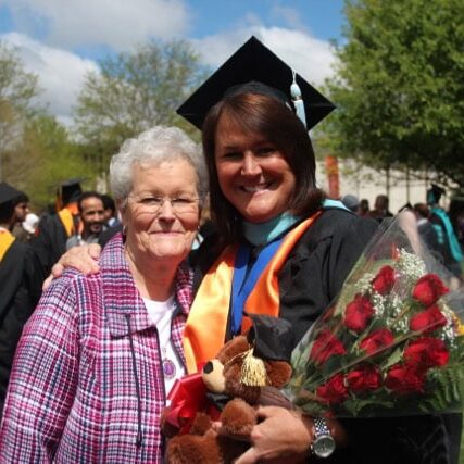 Karen and Julie Yingling at a graduation ceremony
